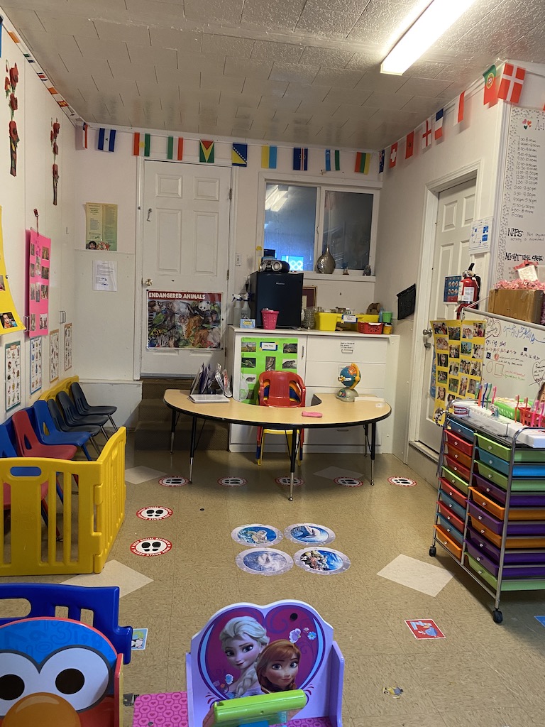 A colorful playroom filled with various toys and a designated play area for children to enjoy and explore.